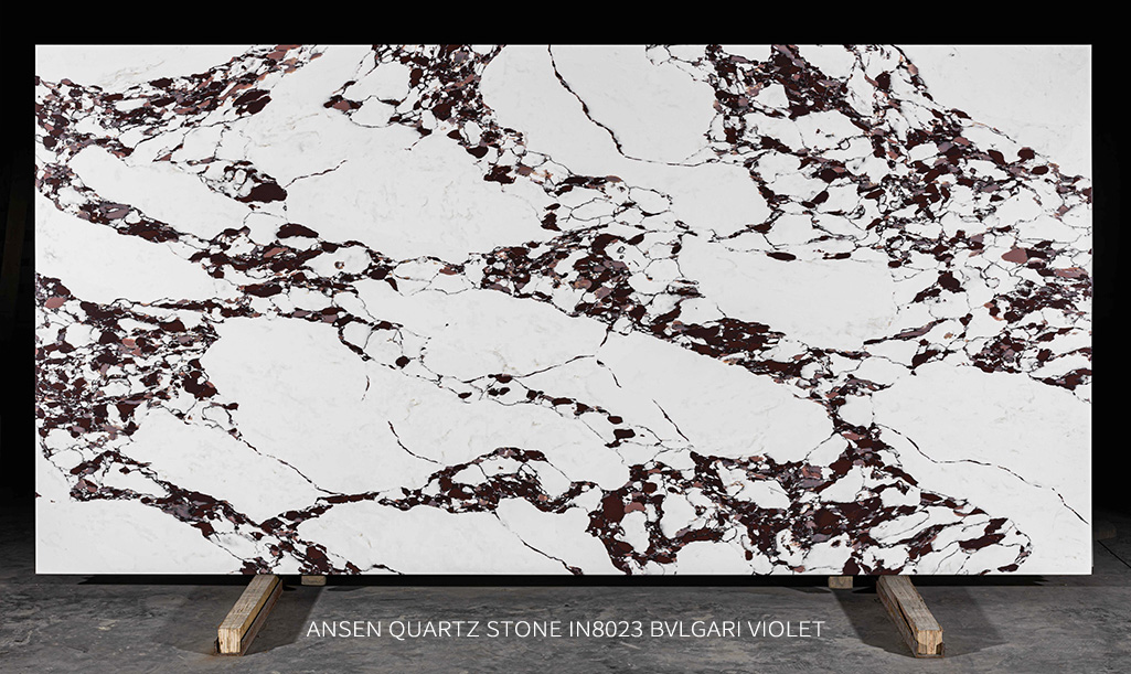 BVLGARI VIOLET Calacatta quartz slab with burgundy and amber veining on a white base BVLGARI VIOLET Calacatta quartz slab with burgundy and amber veining on a white base