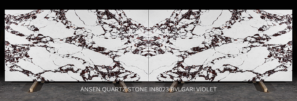 BVLGARI VIOLET Calacatta quartz slabs with matching burgundy and amber veining in a bookmatch pattern BVLGARI VIOLET Calacatta quartz slabs with matching burgundy and amber veining in a bookmatch pattern